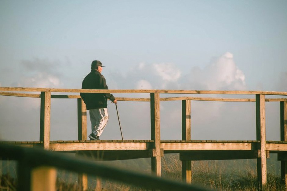 senior man walking outdoors exercise