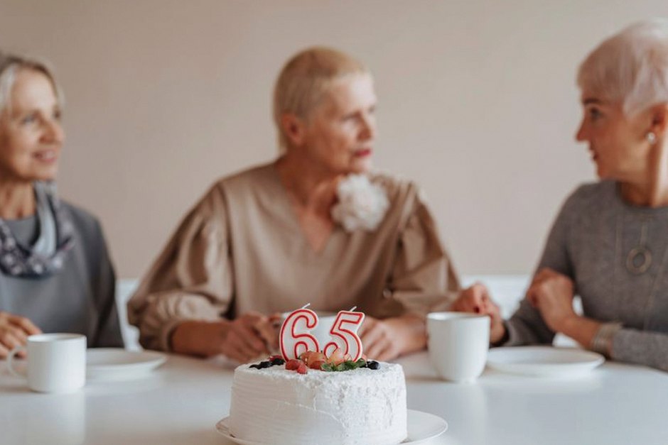elderly friends chatting coffee table
