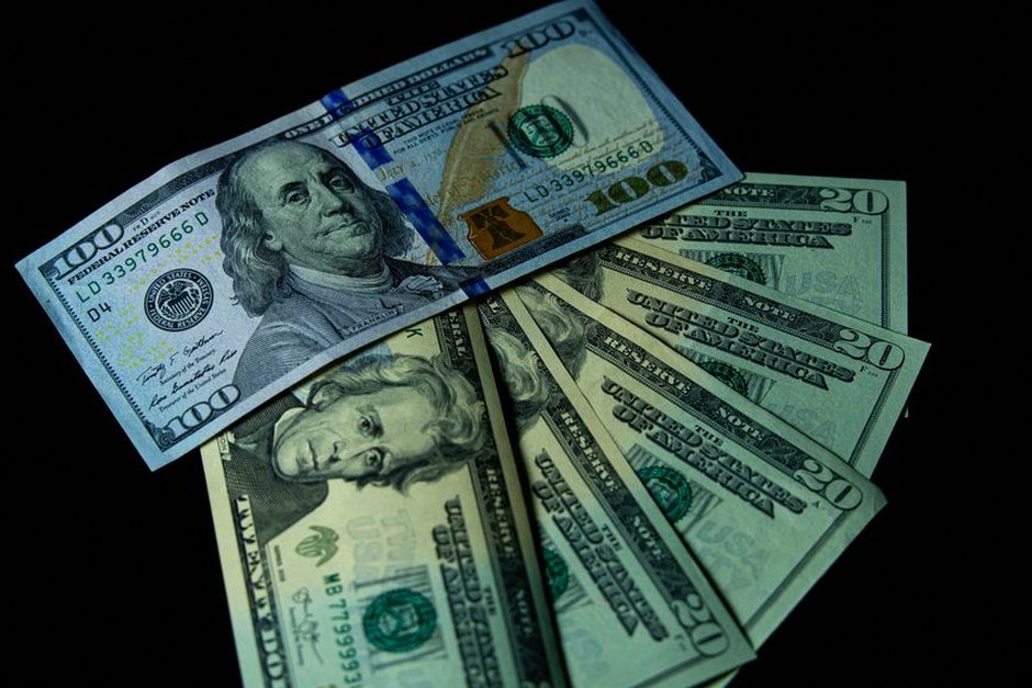 dollar bills and korean won banknotes