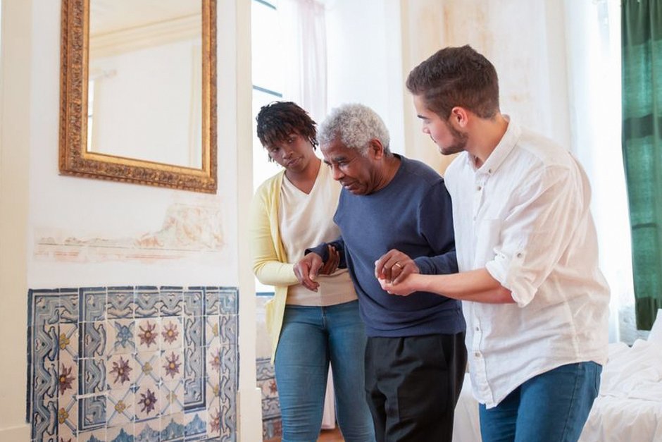 family helping elderly parent smart home app