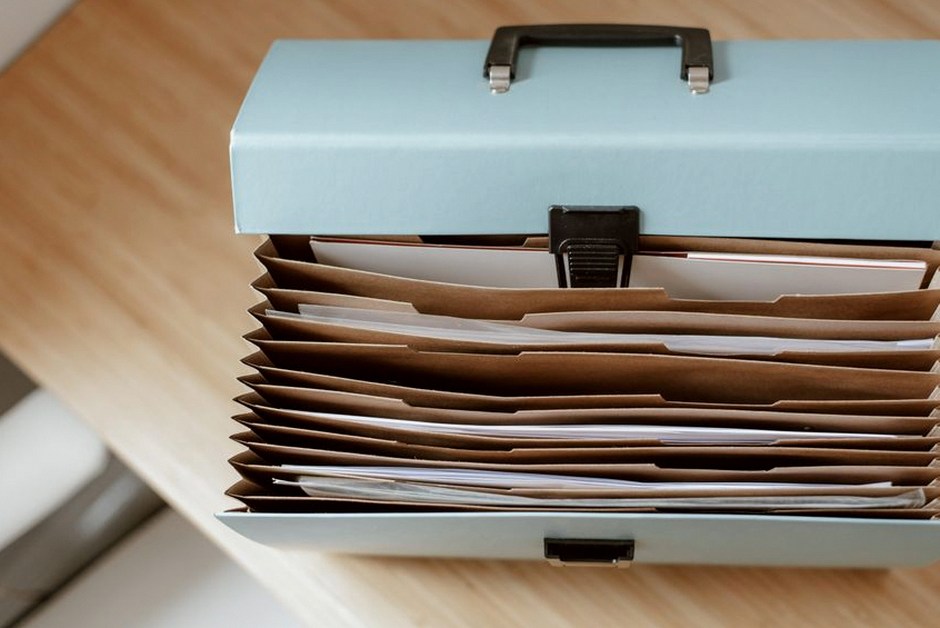 health insurance folder documents desk