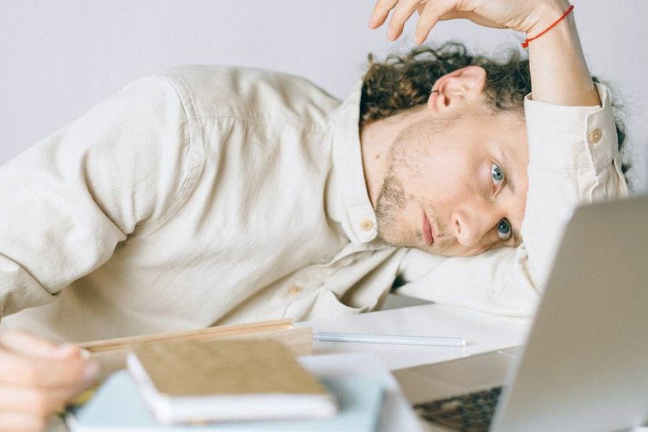 tired person office desk fatigue