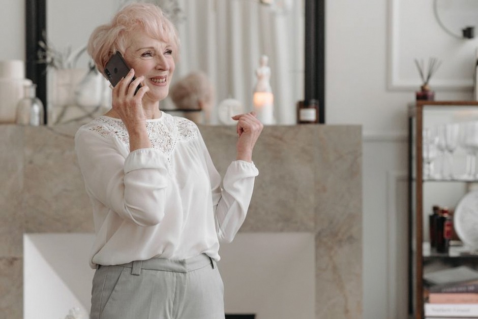 senior woman calling phone home