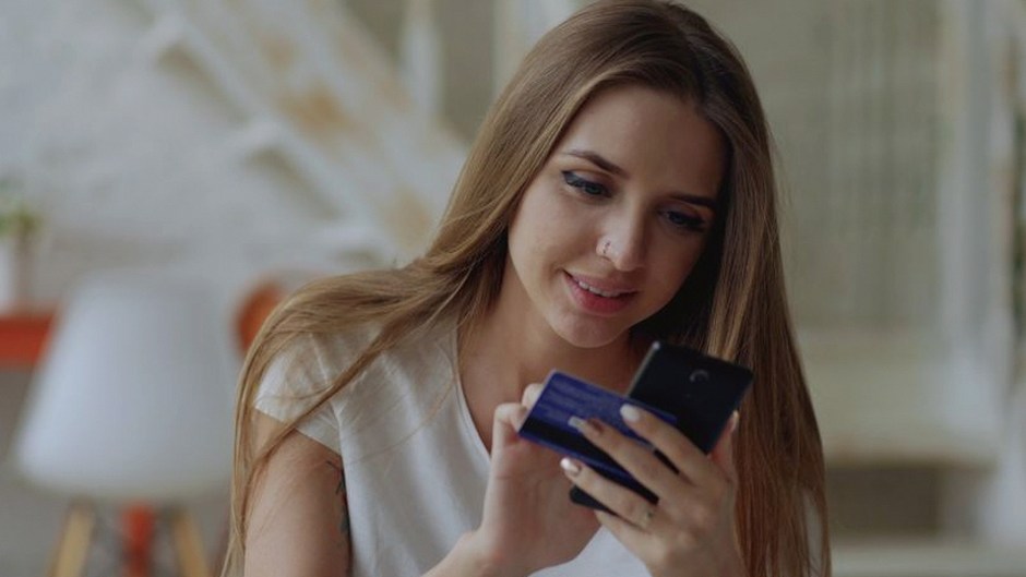 young korean adult using smartphone finance app