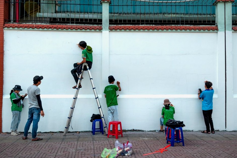 elderly volunteers community painting project