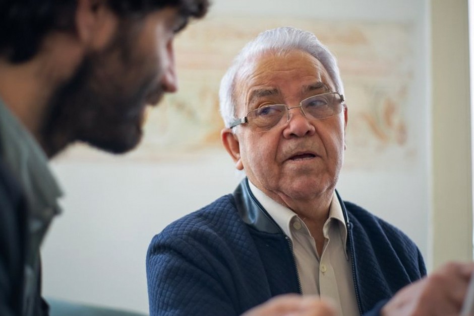 elderly korean person consulting community center staff