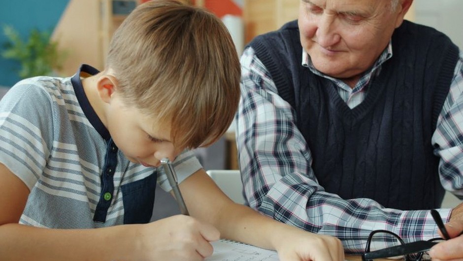 family helping elderly parent paperwork
