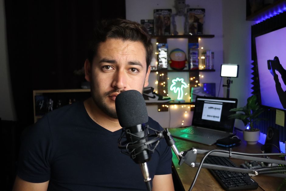person recording youtube video setup desk