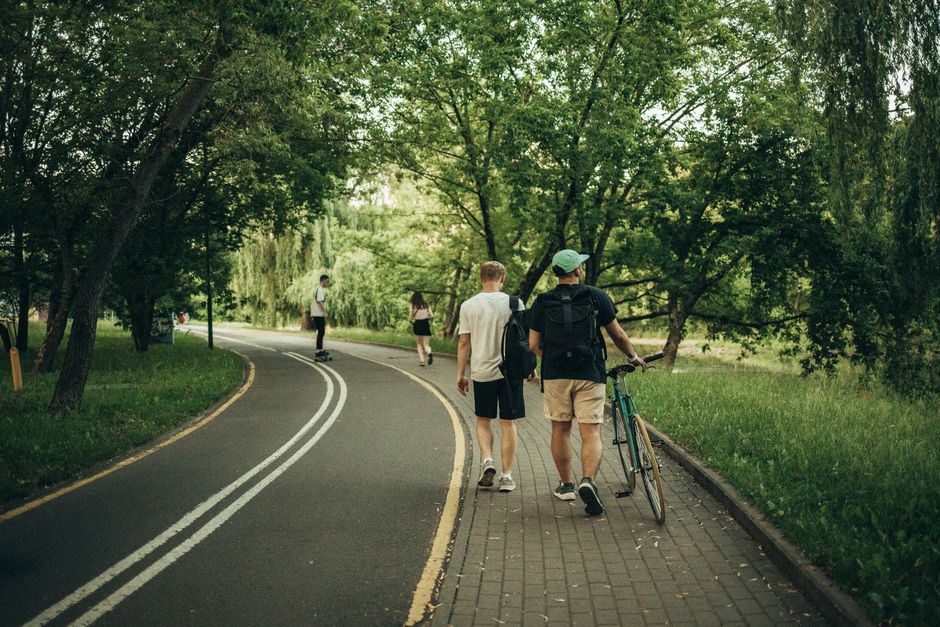 people walking park weekend leisure