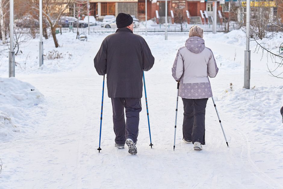 healthy elderly people walking outdoors