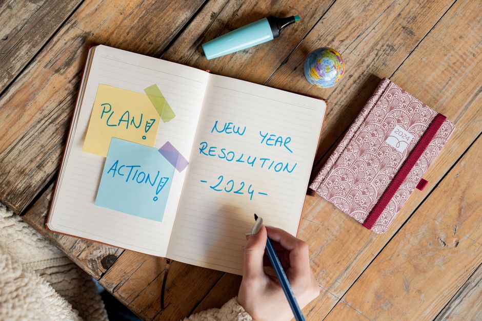 person celebrating small achievement journal