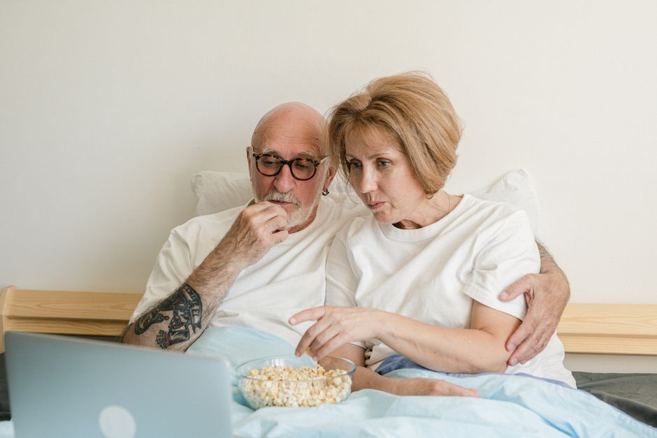 senior citizen watching movie