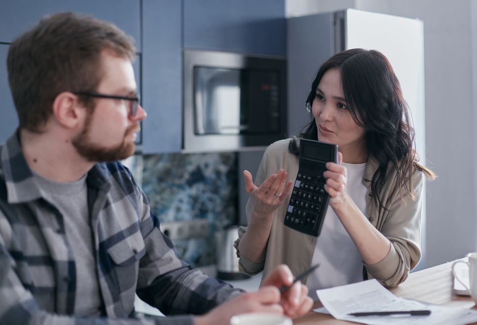 family discussing finances together at home