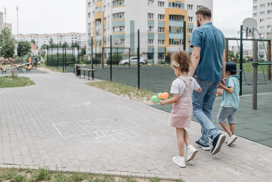 family walking park children playground