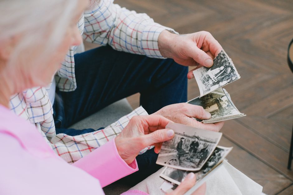 senior couple looking at photos together