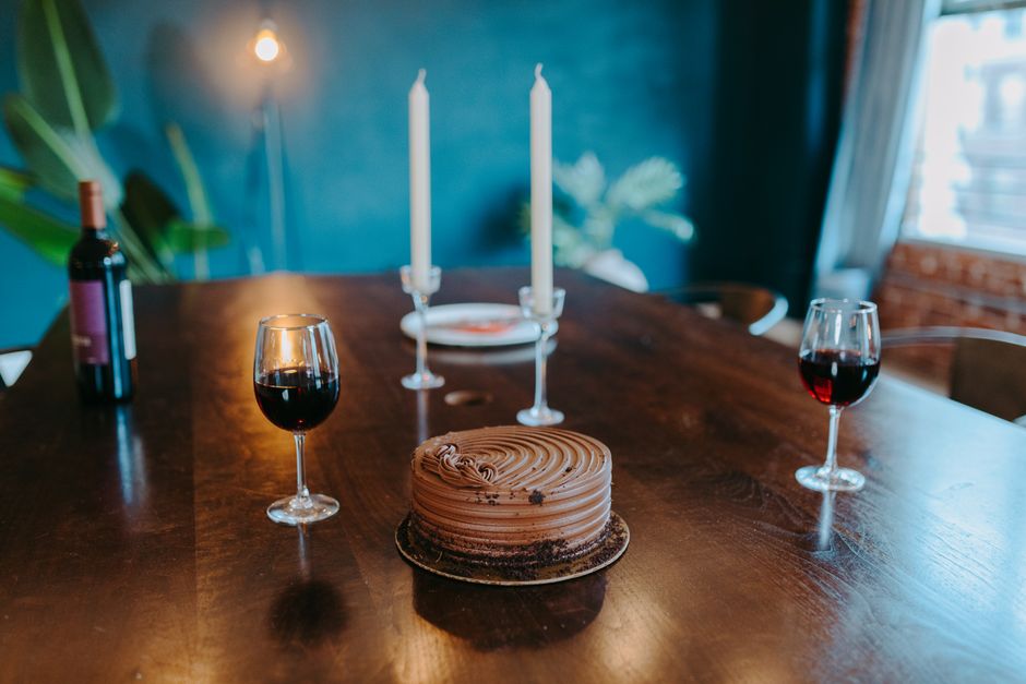 romantic dinner setup candles wine glasses