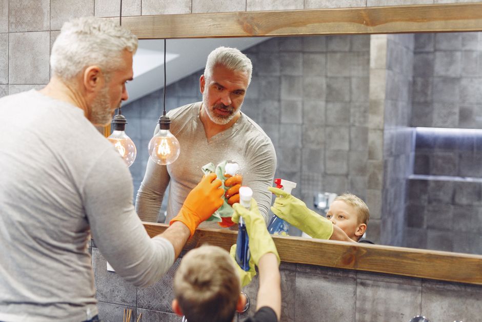 family helping elderly parent clean