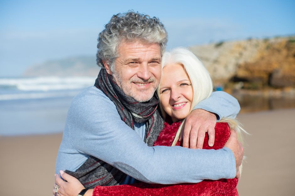 senior couple traveling together happy