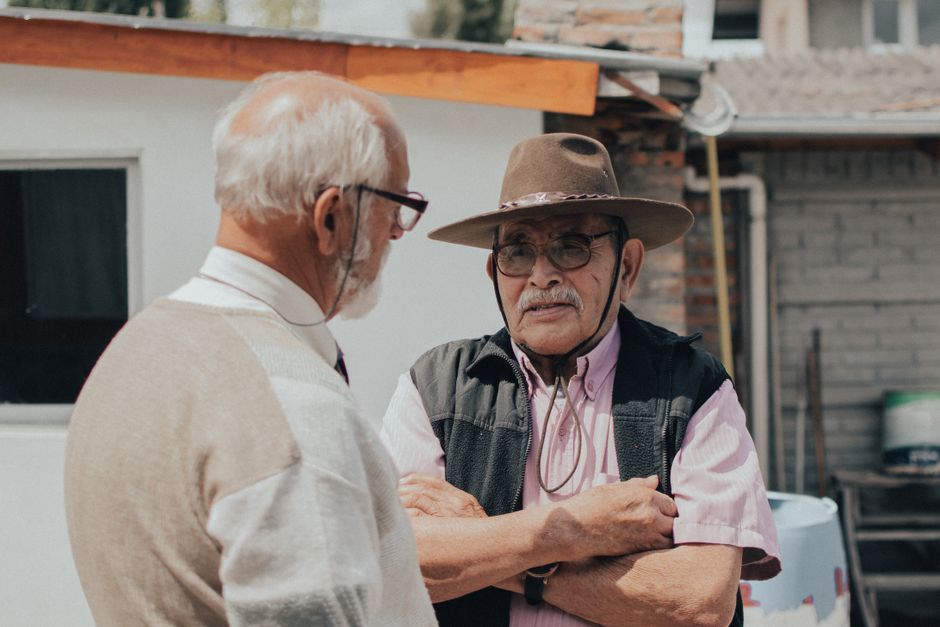 senior friends talking community center