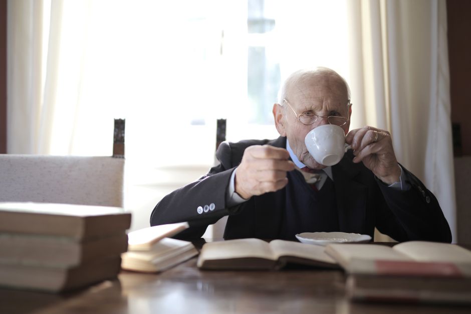 senior resting after cleaning tea