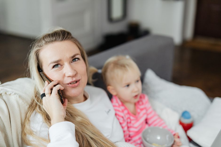 family checking on elderly parent phone call